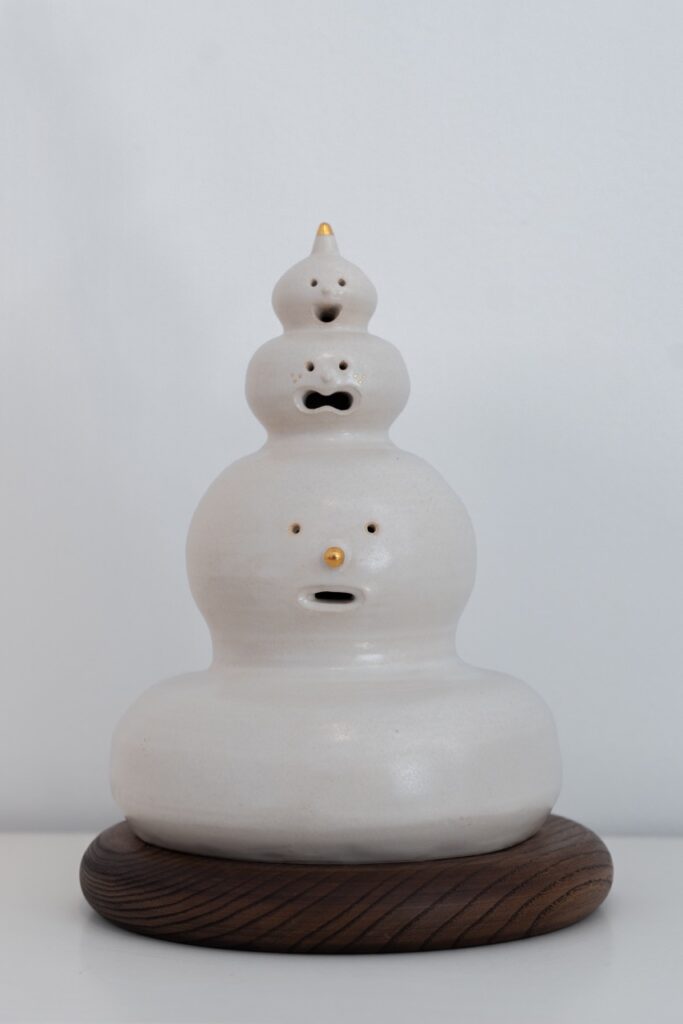 Piled Three Head Statue
